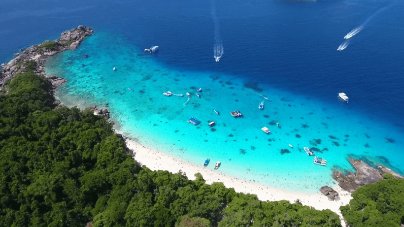 videoblocks-popular-princess-beach-and-blue-clear-water-with-boats-and-small-islands-aerial-hd-slowmotion-similan-thailand_rir6i5r5x_thumbnail-full01